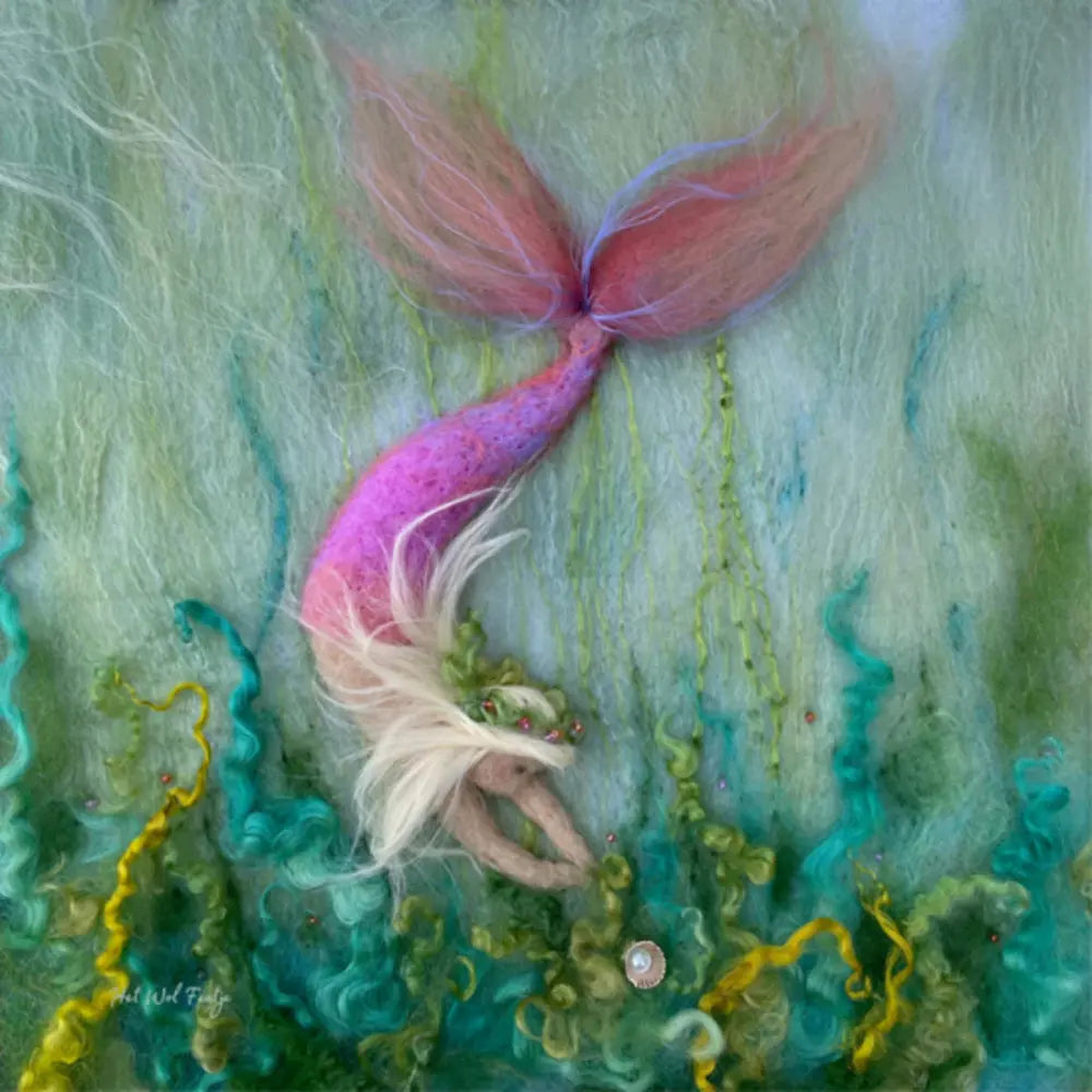Mermaid with a pink tail lying among sea grasses on a textured green background