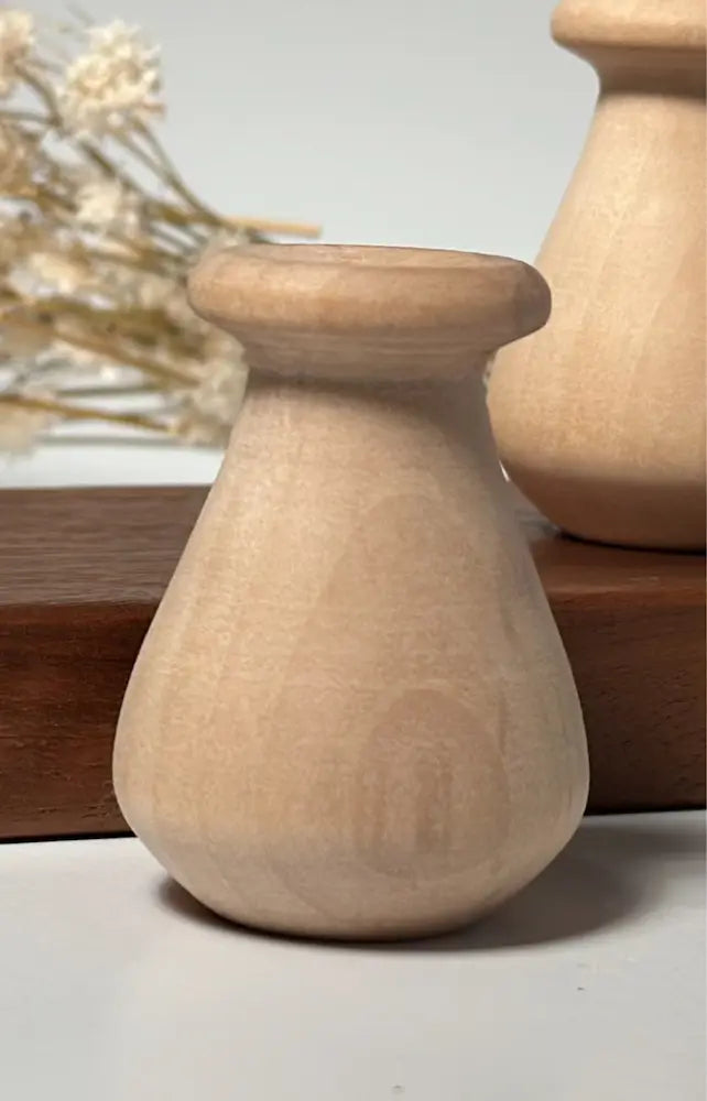 Wooden vase on a neutral background