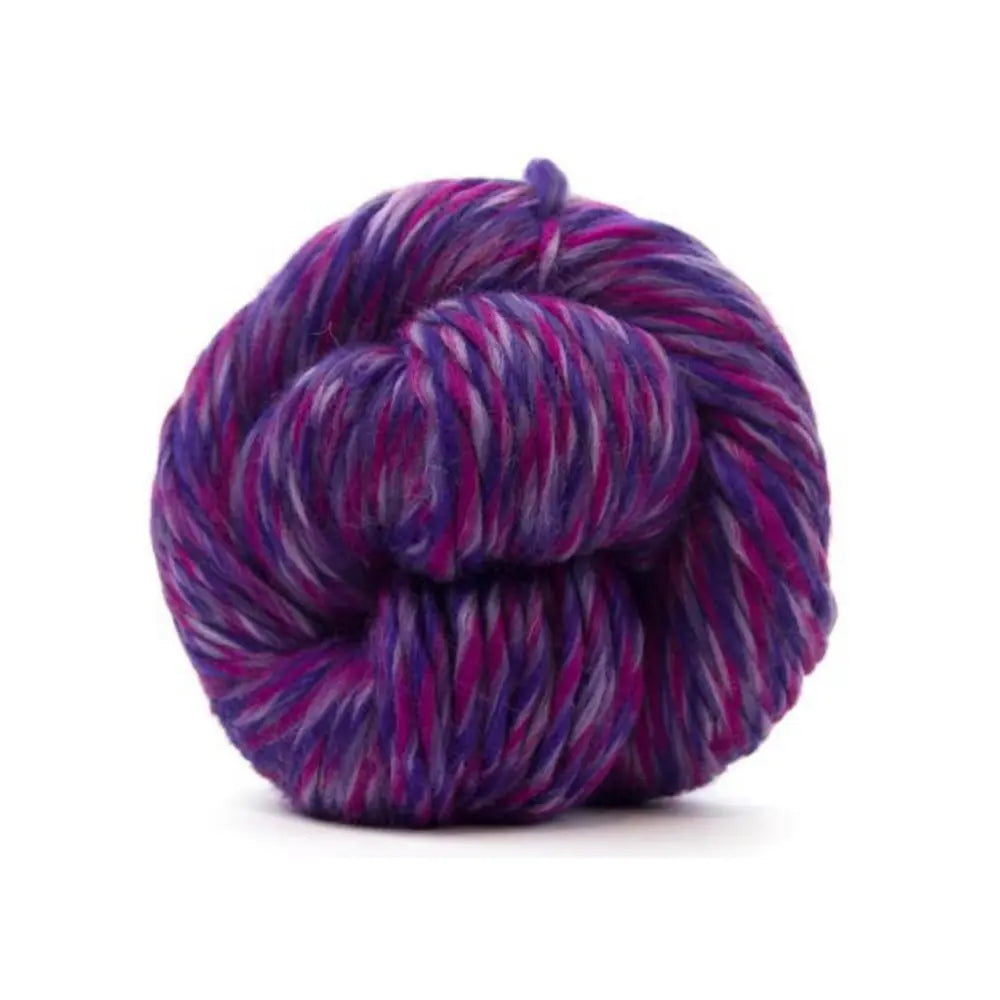 Multicolored skein of yarn on a white background