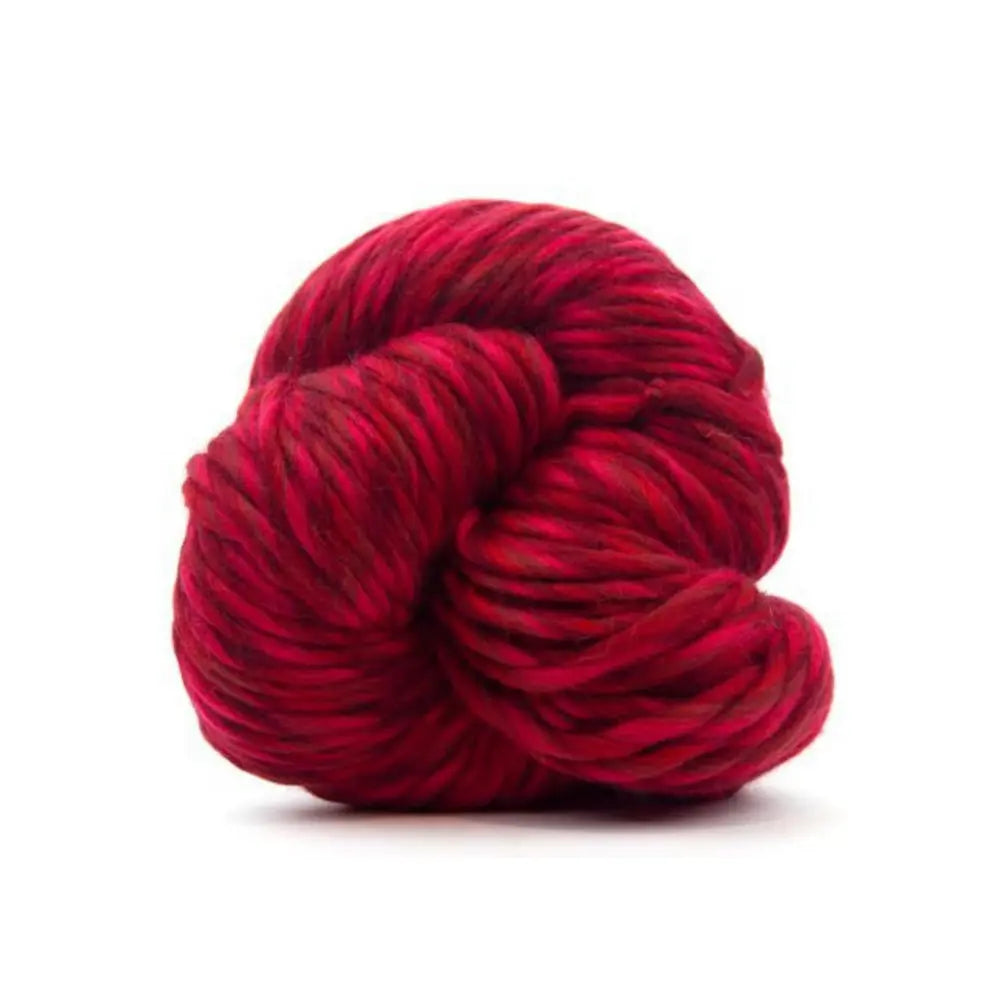 Red skein of yarn on a white background