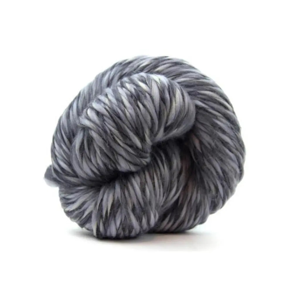 Gray and white skein of yarn on a white background