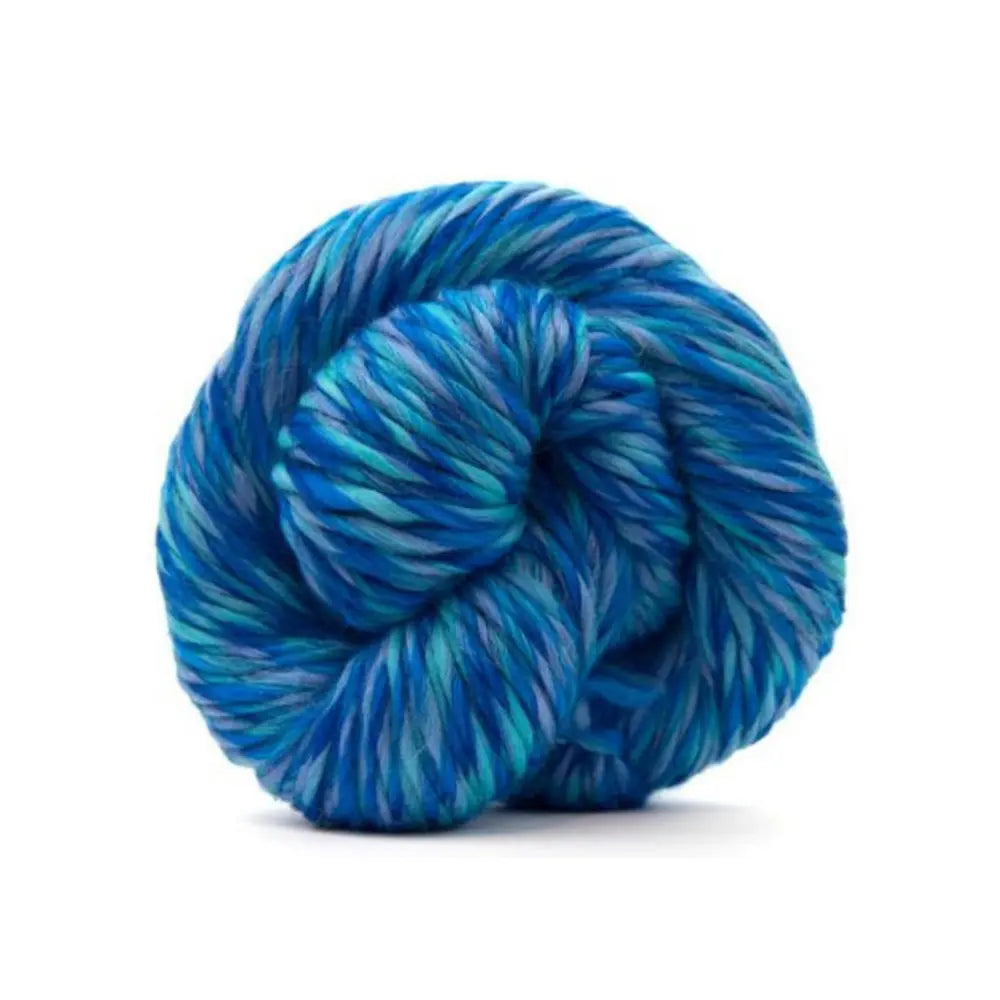 Blue skein of yarn on a white background