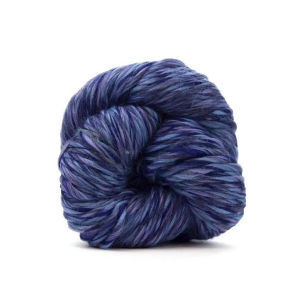 Blue skein of yarn on a white background