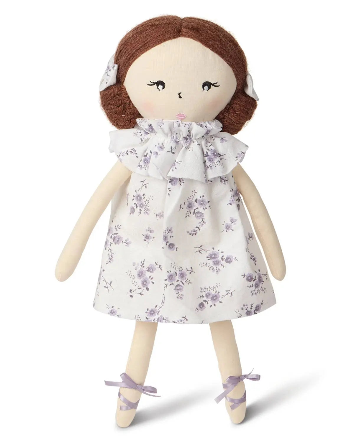 Cotton and linen doll with a white dress featuring purple floral patterns on a white background