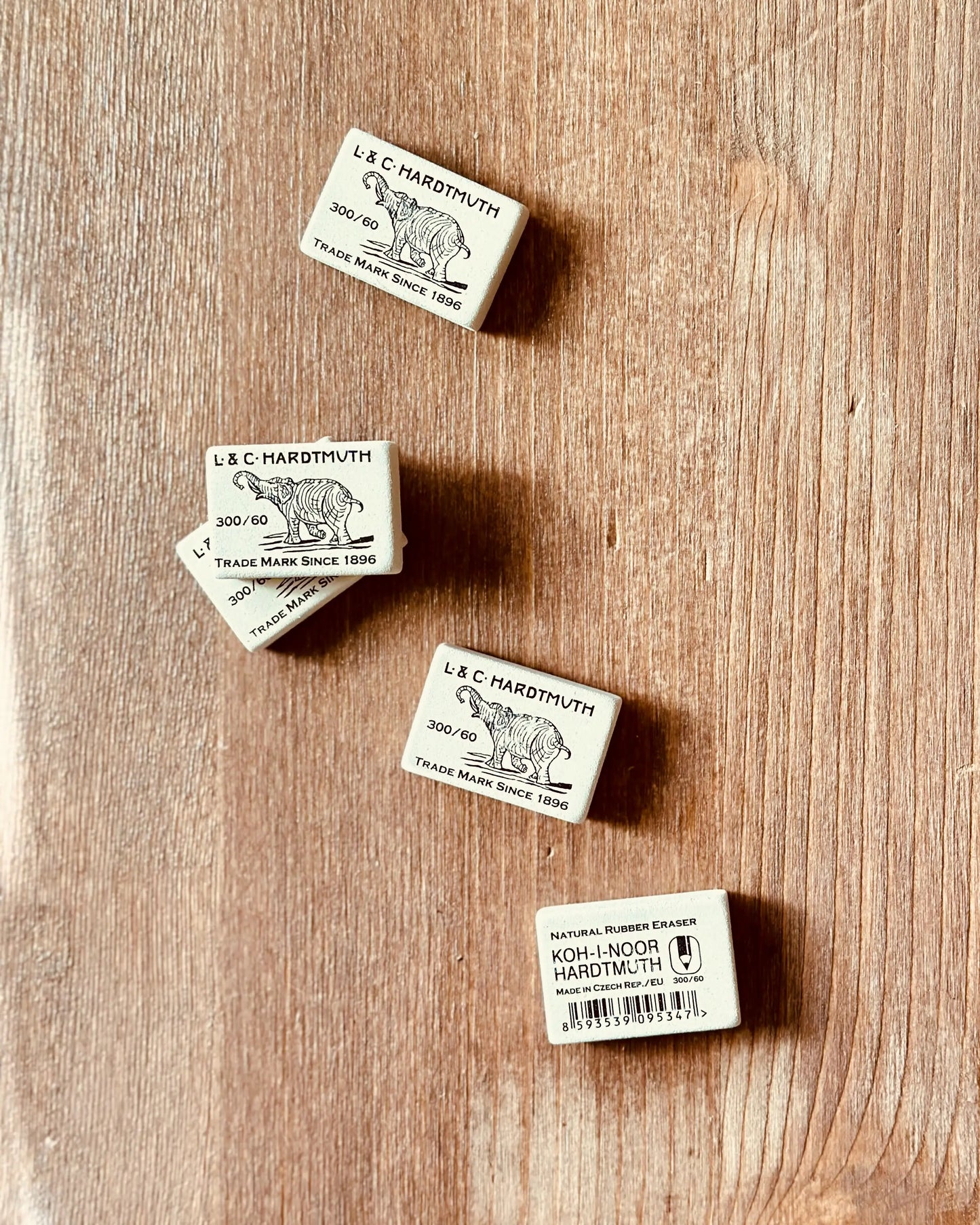 natural rubber erasers koh-i-noor 300/60 arranged on wood surface plastic-free erasers