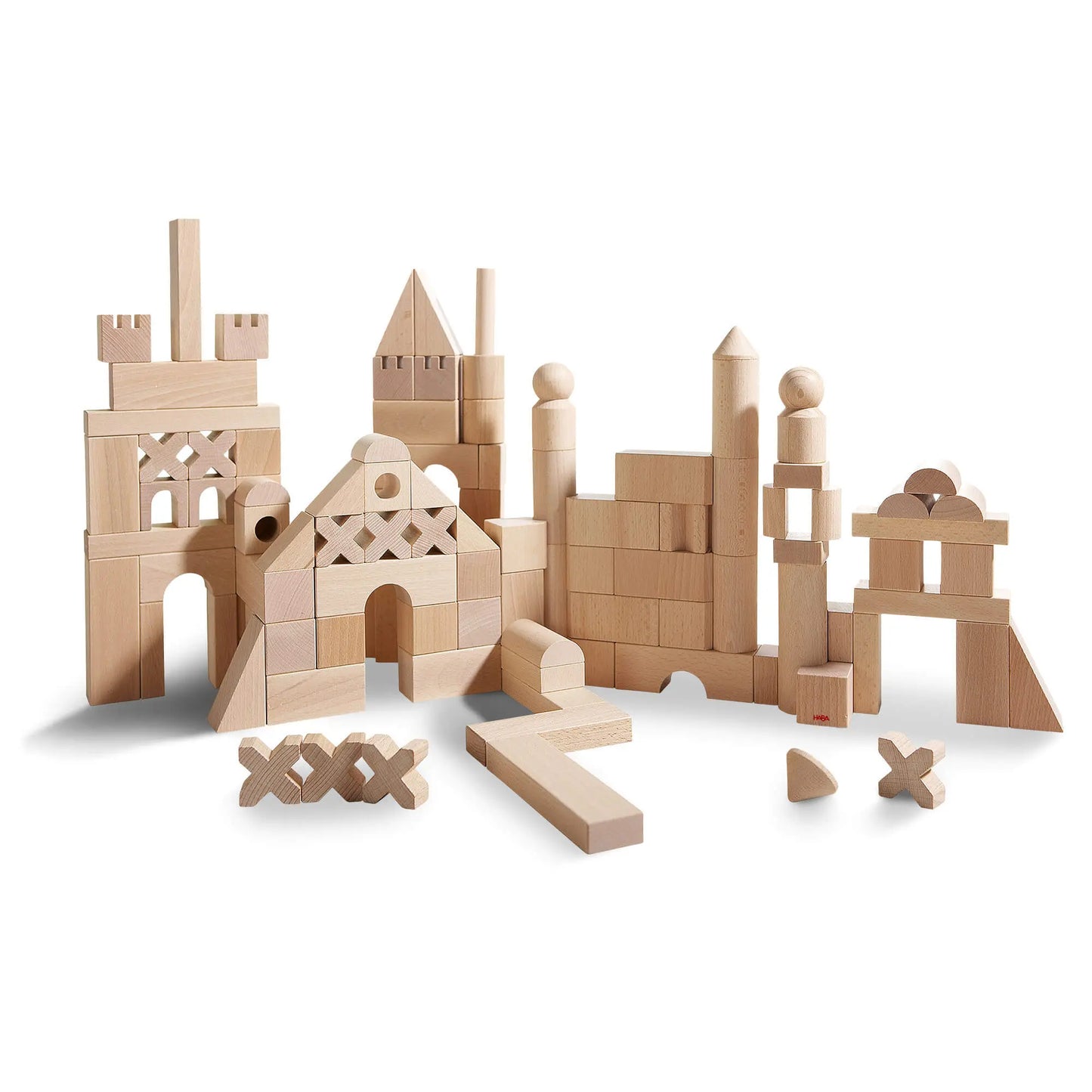 Stackable wooden blocks on white background, imaginative play
