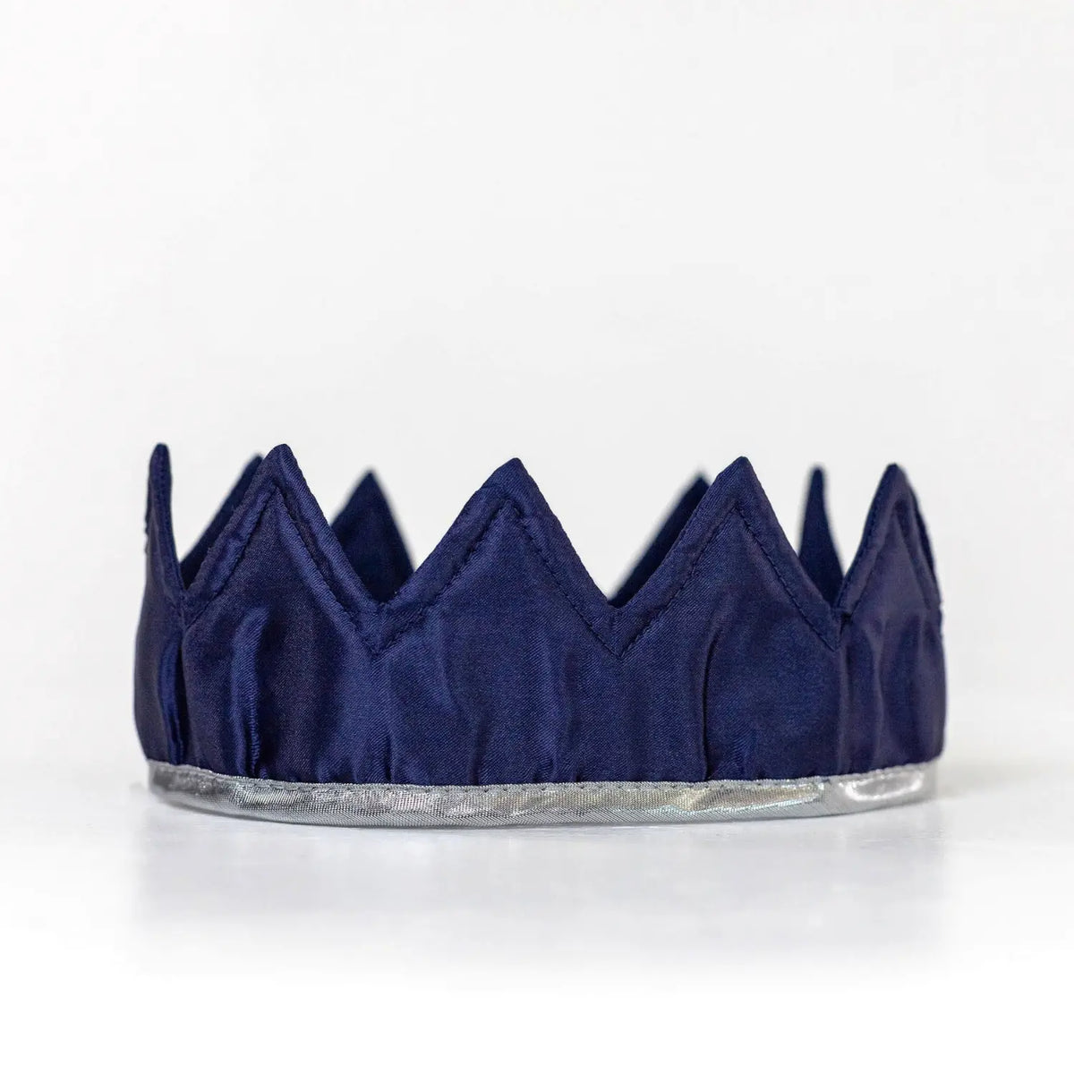 Navy blue and silver satin dress-up crown with silver trim for imaginative dress-up play