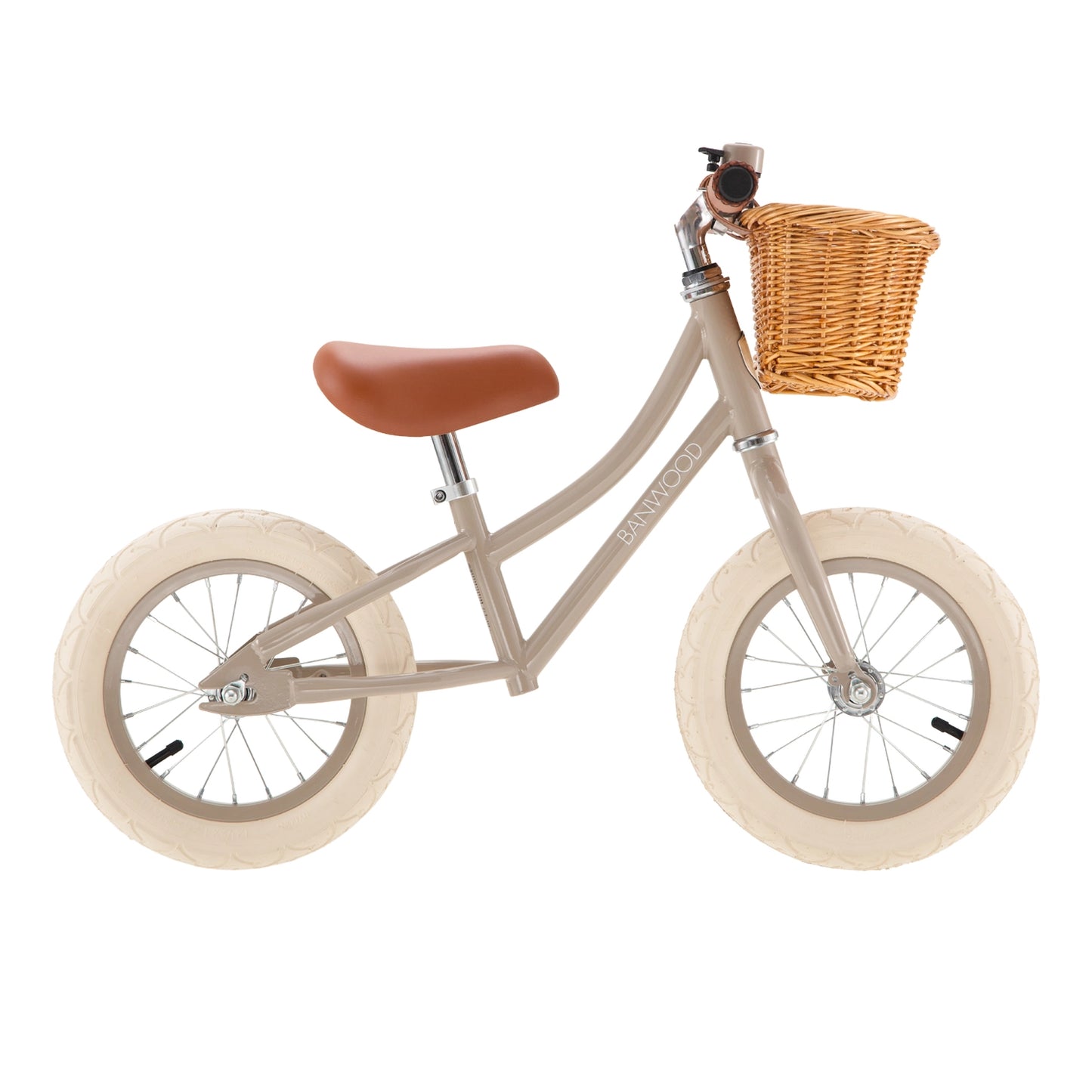 Beige balance bike with a wicker basket on a white background