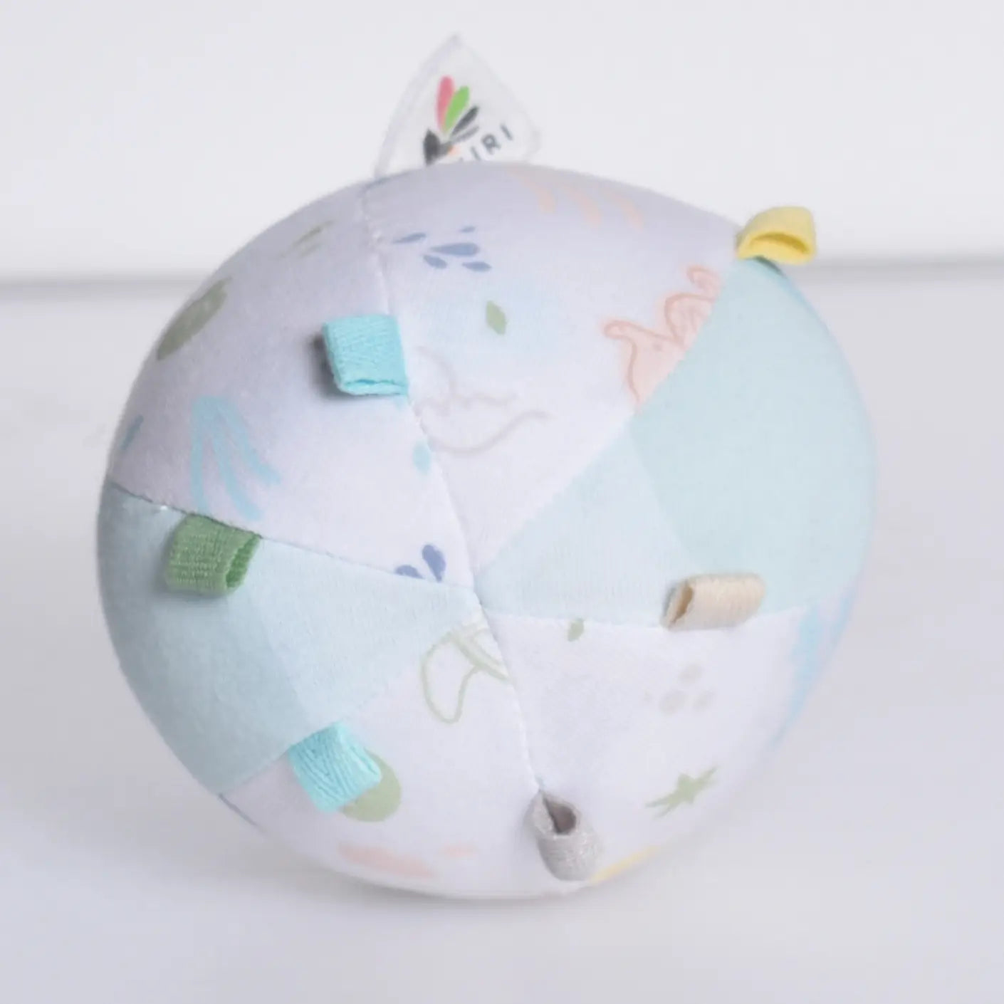 Organic cotton baby activity ball rattle back view showing soft fabric construction