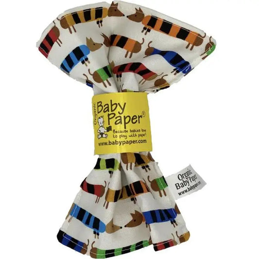 Baby paper with colorful dog pattern and 'Baby Paper' branding on a white background