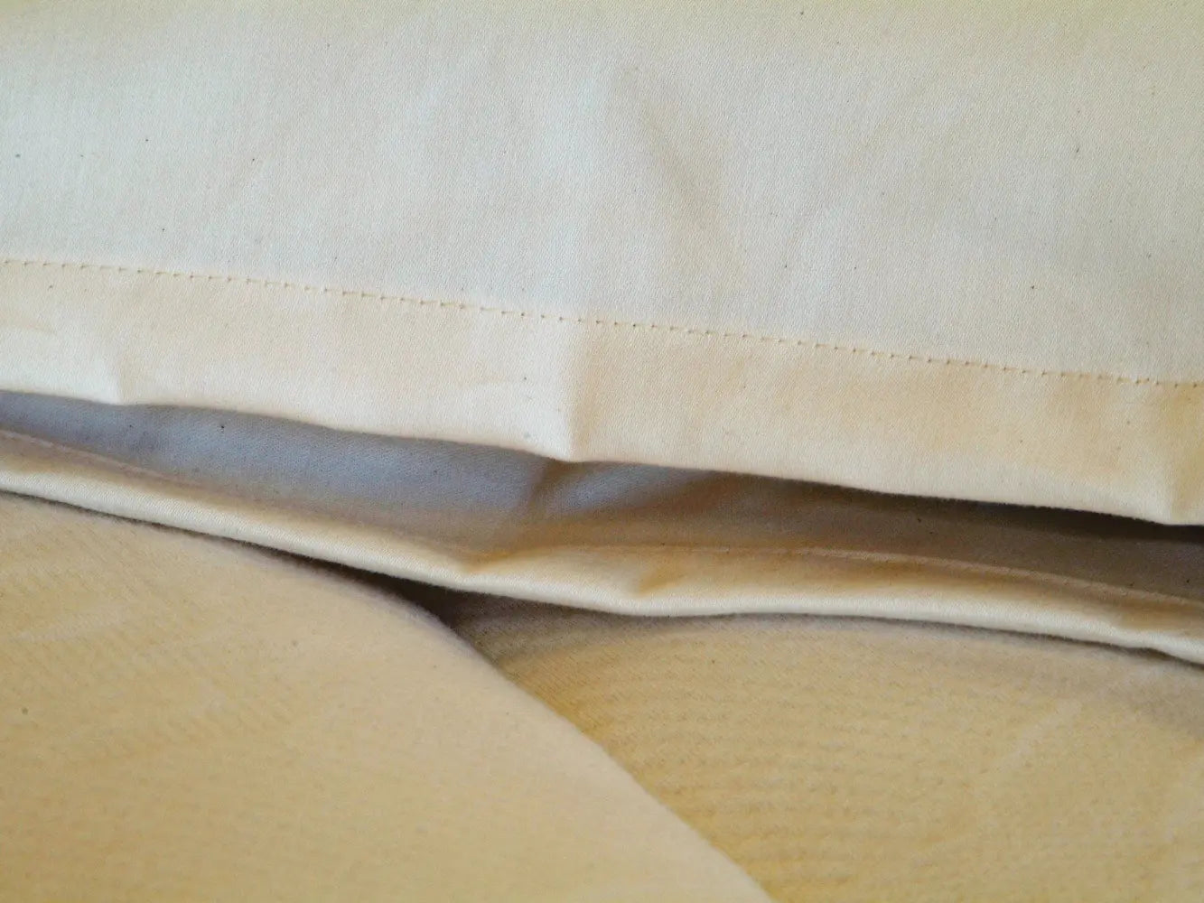 Close-up of organic cotton pillow case seam 