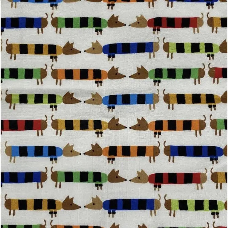Pattern of colorful dogs in sweaters on a white background