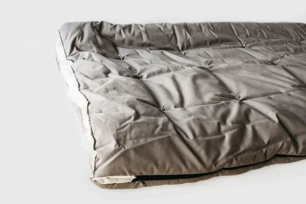  Cotton and Wool brown open sleeping bag on light background