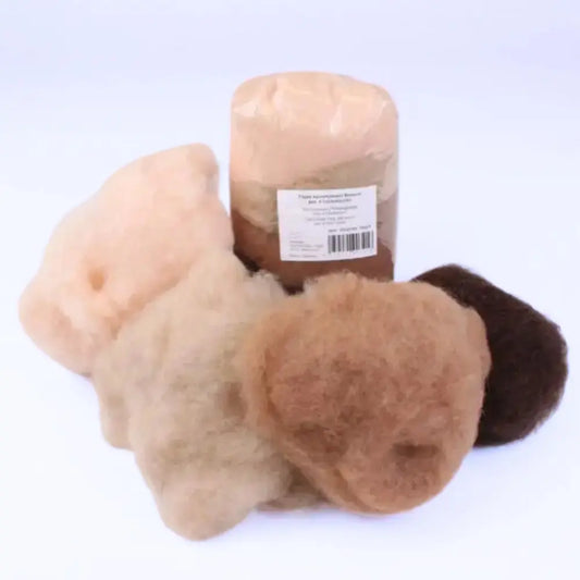 Three skeins of yarn in beige, brown, and black on a white background with a label.