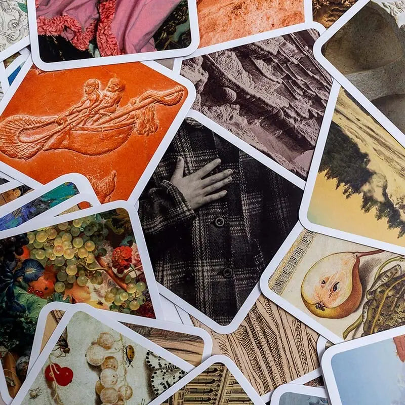 Close up of OuiSi Getty visual connection game cards showing artwork detail