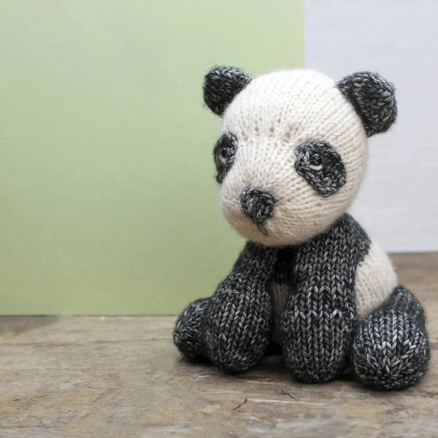 Finished panda bear stuffed animal made from a Scheepjes knitting kit