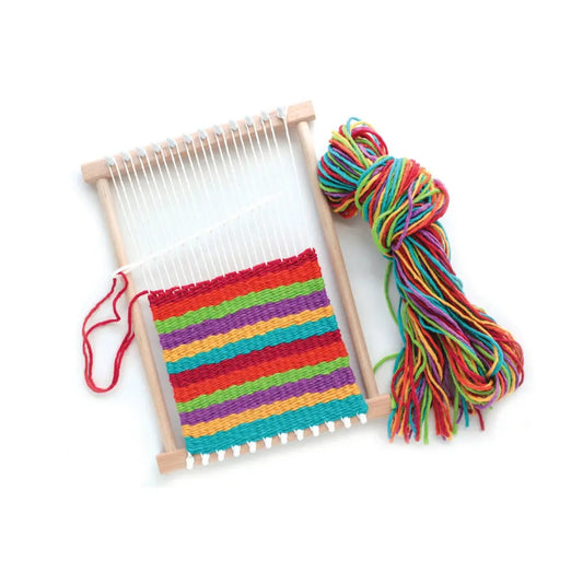 Children's weaving loom with colorful yarn on a white background
