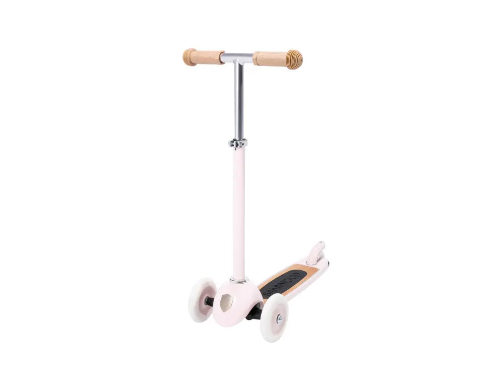 Pink scooter with wooden handlebar and deck on a white background