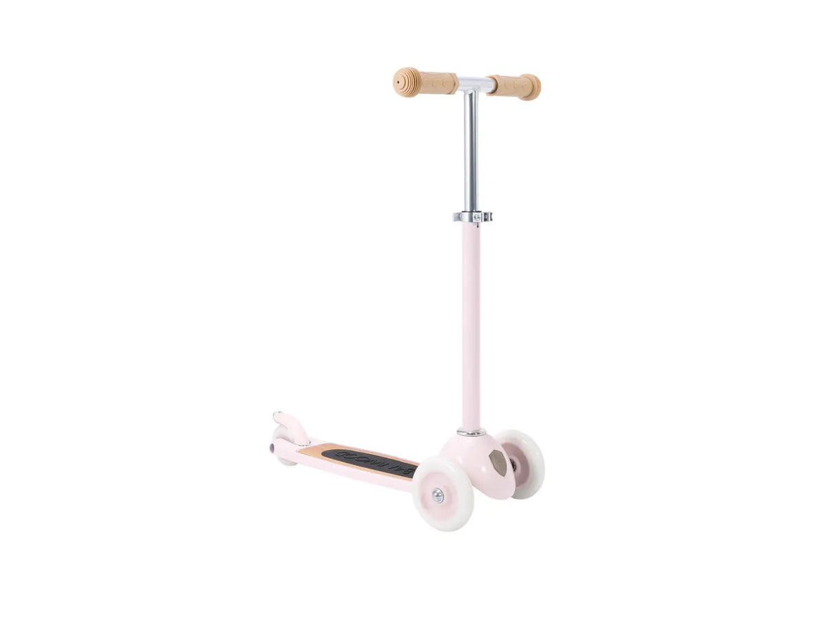 Pink three wheeled Banwood scooter set at an angle on a white background