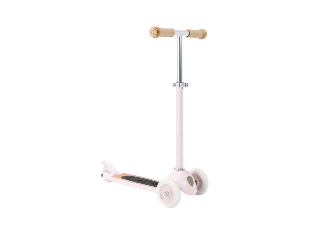 Pink scooter with wooden handlebars on a white background