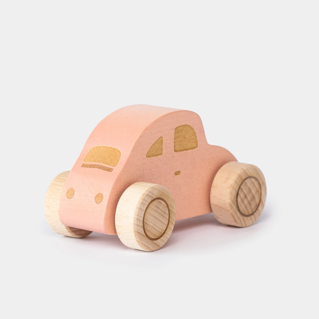 Pink wooden beetle toy car back view for preschool play 