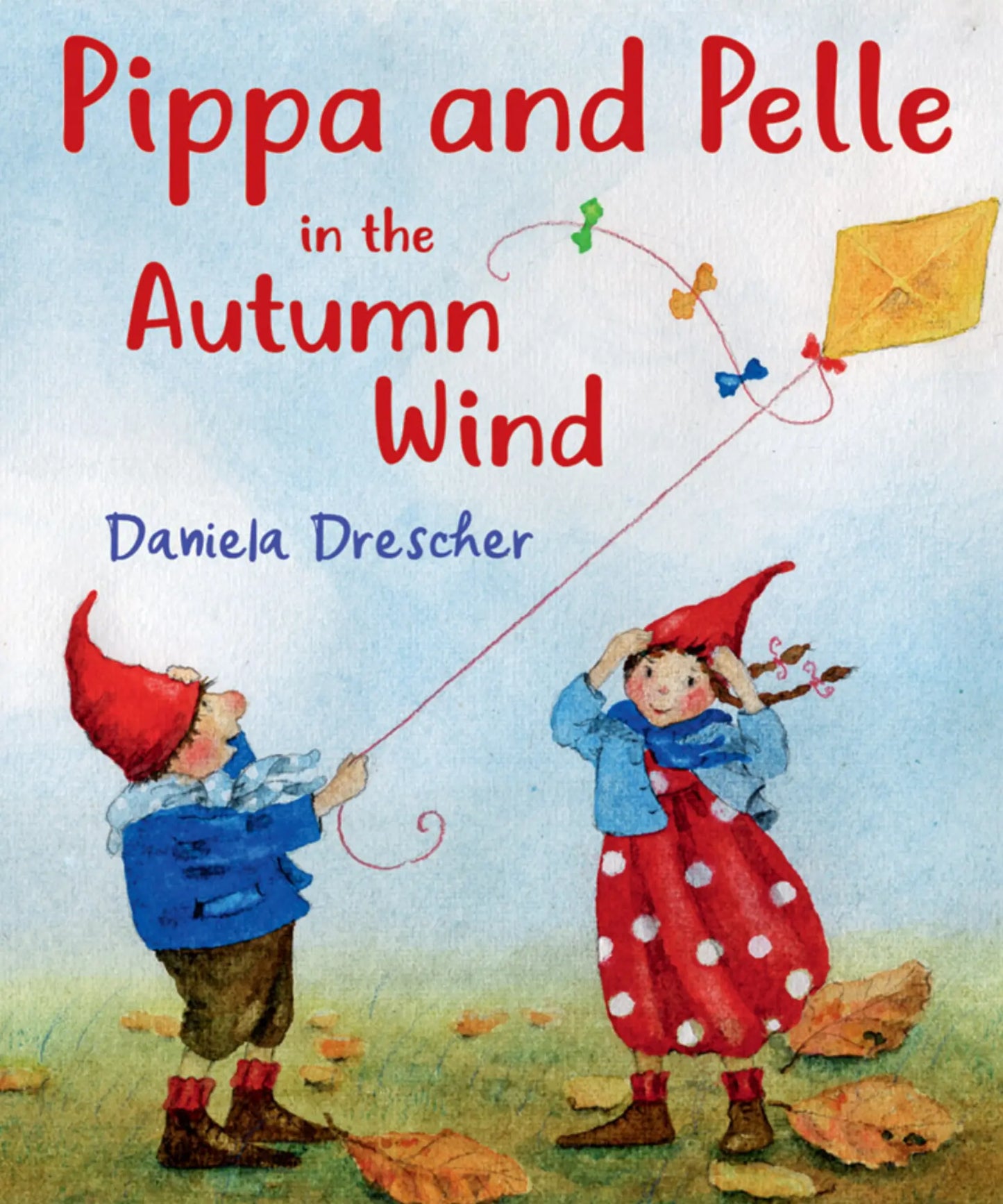 Book cover of 'Pippa and Pelle in the Autumn Wind' with two children flying a kite.