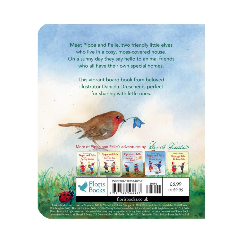 Back cover of Pippa and Pelle and the Cosy Home with a robin holding a flower
