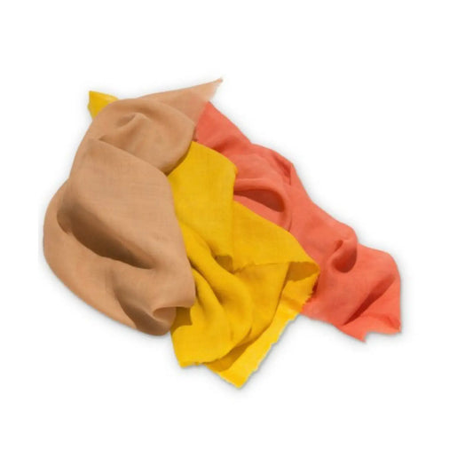 Three autumn plant dyed wool cloths in brown, yellow, and orange on a white background