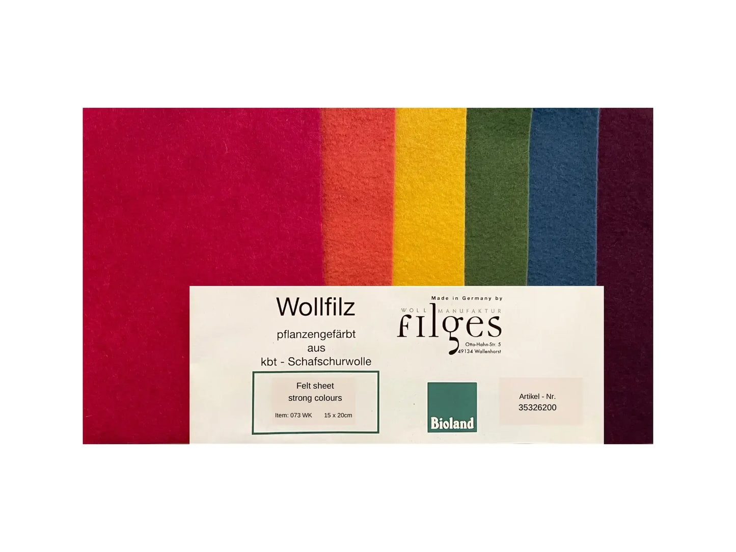 Plant-dyed wool felt sheets fanned out showing color range and natural wool texture
