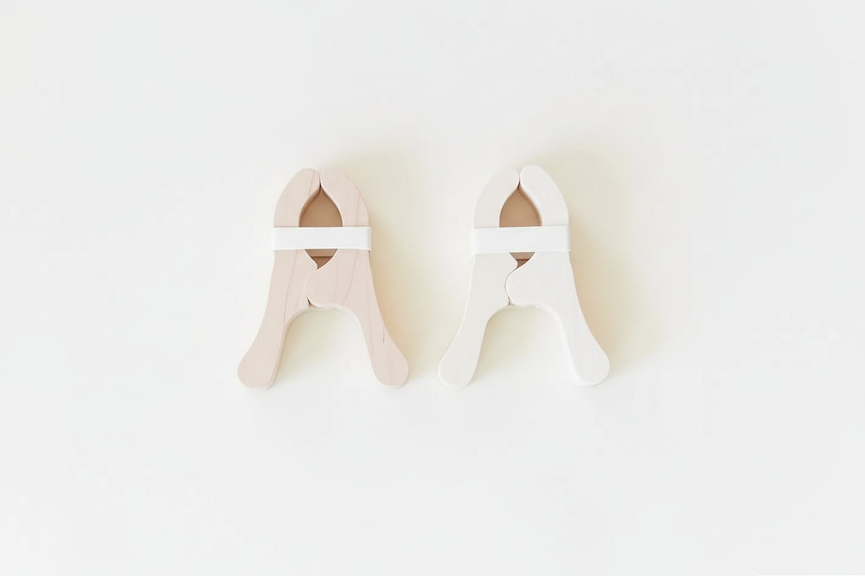 Sarah’s Silks Four Playcloth Clips on a white background