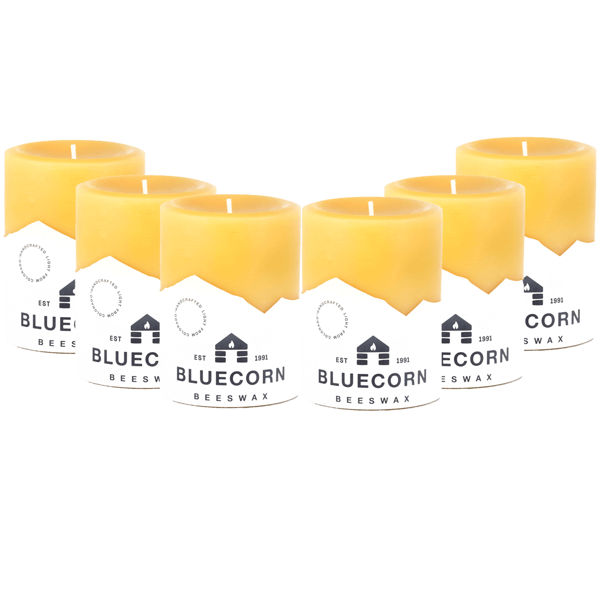 Set of six yellow candles with Bluecorn Beeswax packaging on a white background
