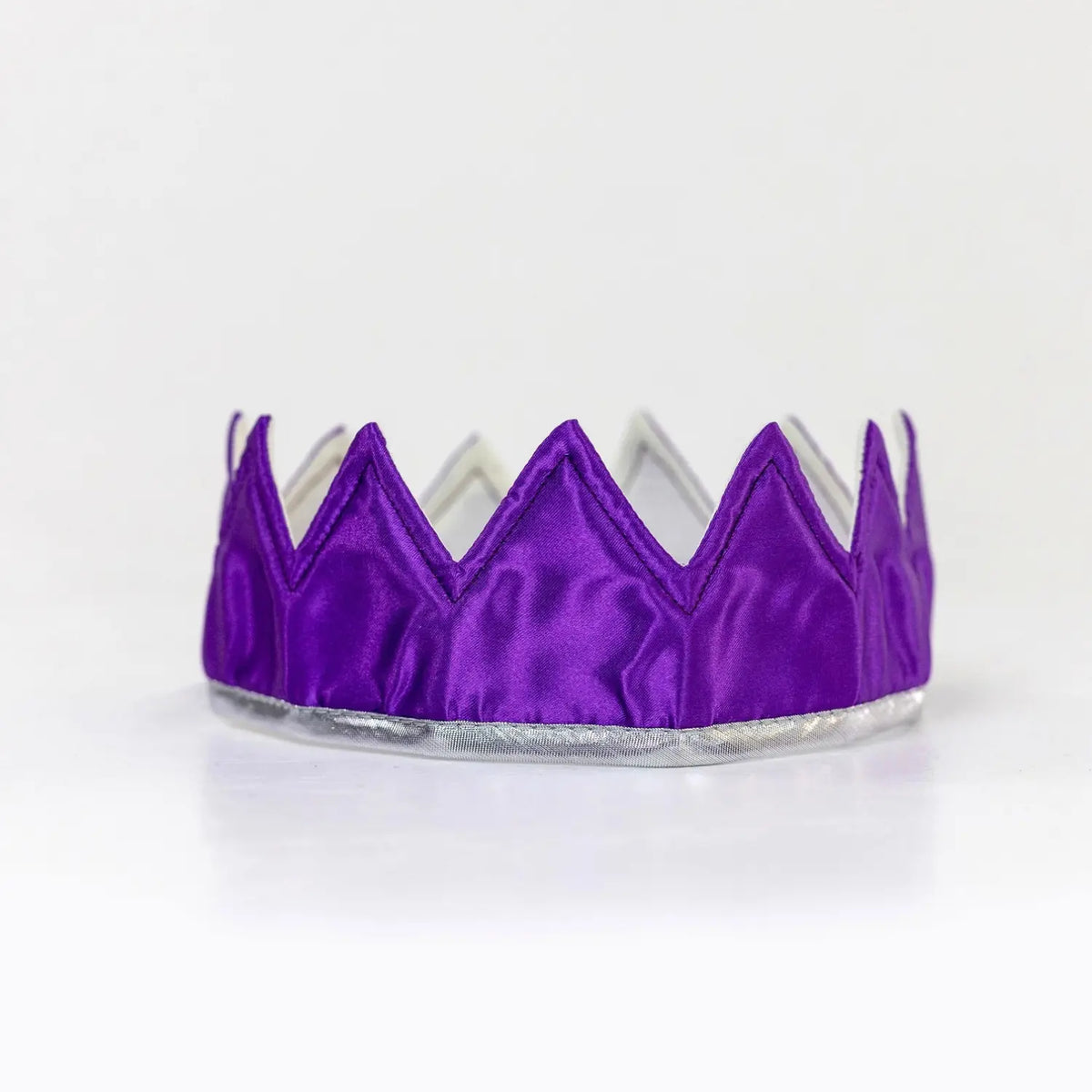 Purple and silver satin dress-up crown with silver trim for imaginative dress-up play