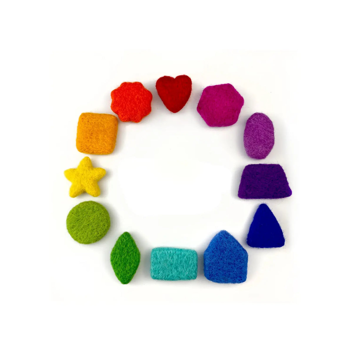 Twelve rainbow wool felt sorting shapes, including a heart, star, hexagon, and triangle, arranged in a color-wheel circle.