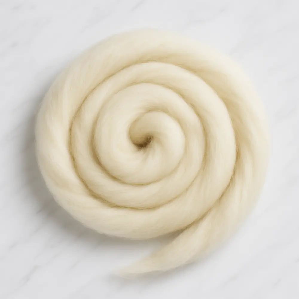 Rambouillet Wool Combed Top roving coiled into a bundle