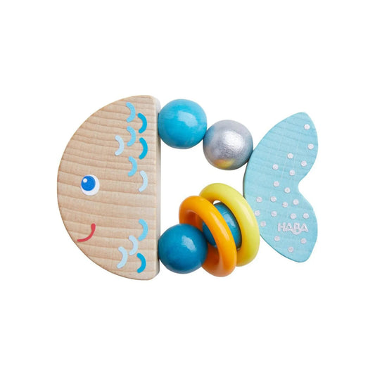 Colorful fish-shaped toy with wooden parts and colorful rings on a white background