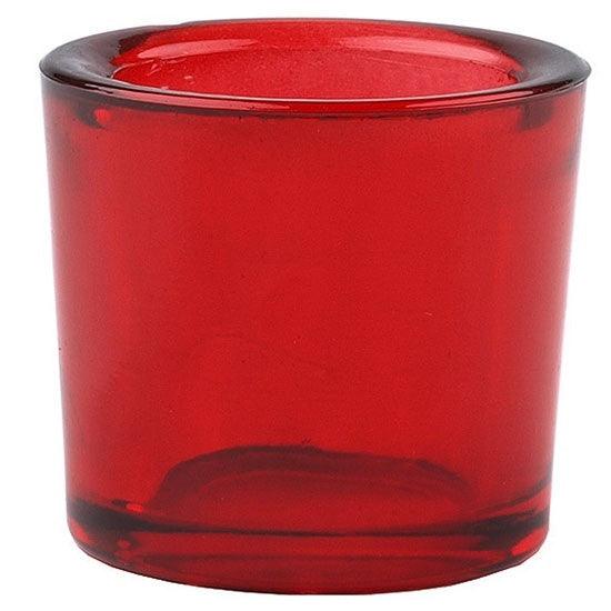 Red glass candle holder on a white background