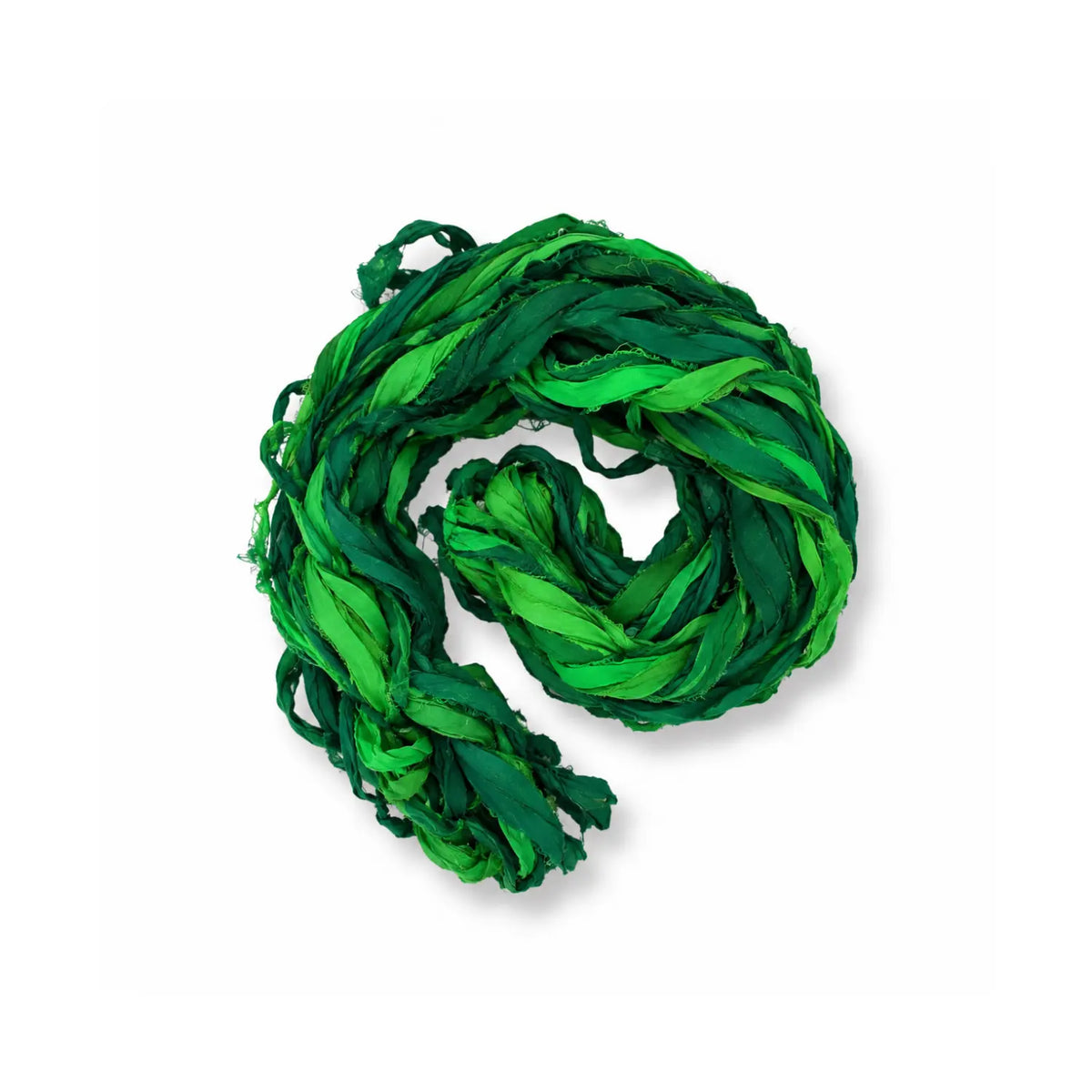 Loosely coiled hank of mustard-gold recycled sari silk chiffon ribbon yarn, Reef Green colorway