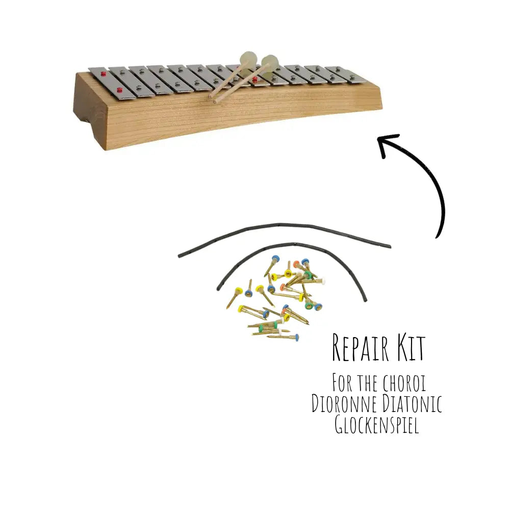 Glockenspiel with repair kit components on a white background