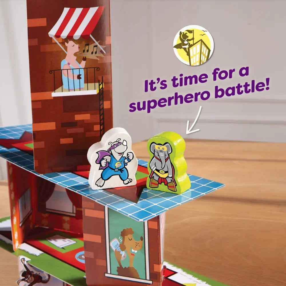 Close up of wooden superhero figure on card tower in Rhino Hero Super Battle game