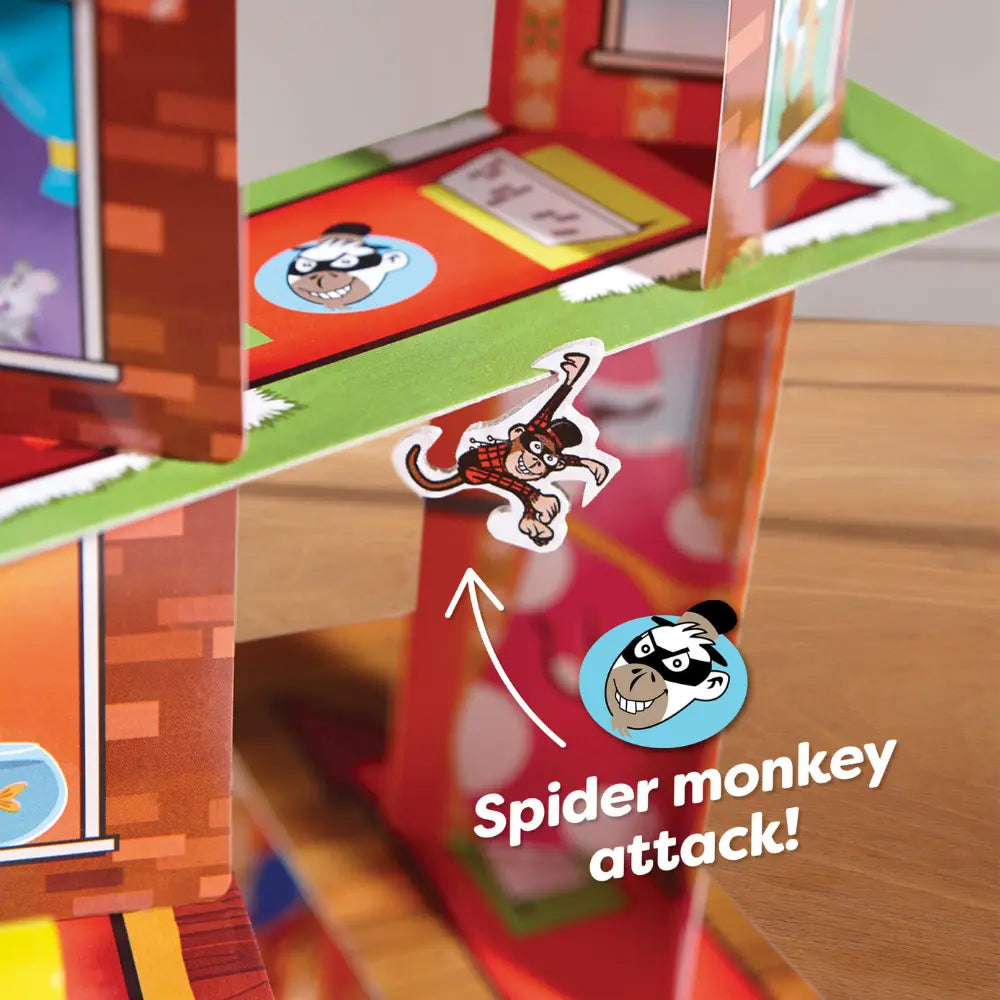 Close up of spider monkey figure on card house in Rhino Hero Super Battle