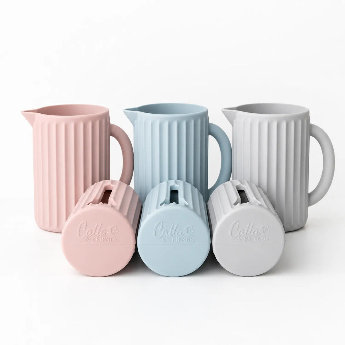 Ripple silicone bath spout covers and coordinating rinse cups in petal pink, powder blue, and whisper grey
