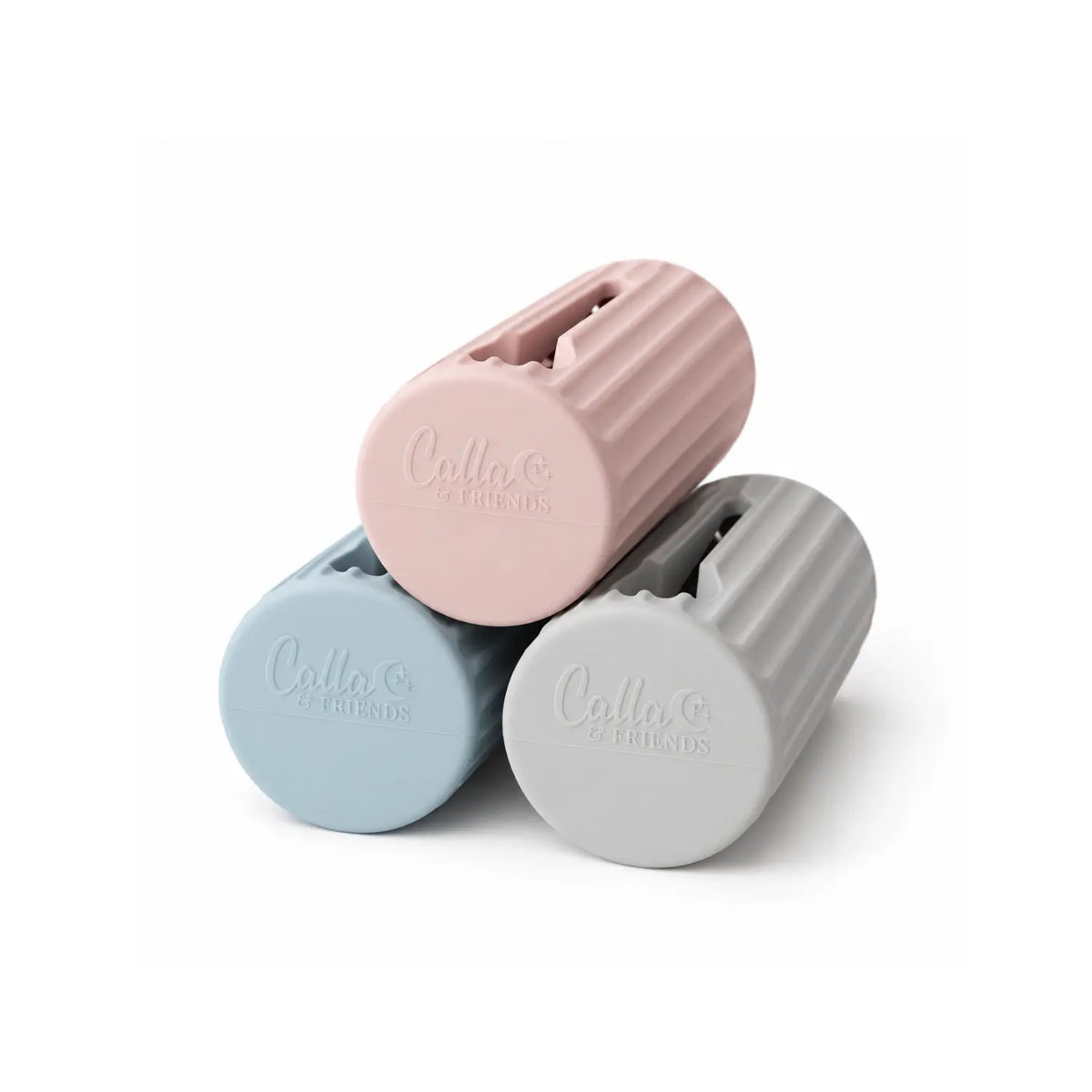 Calla & Friends Ripple silicone bath spout covers in petal pink, powder blue, and whisper grey