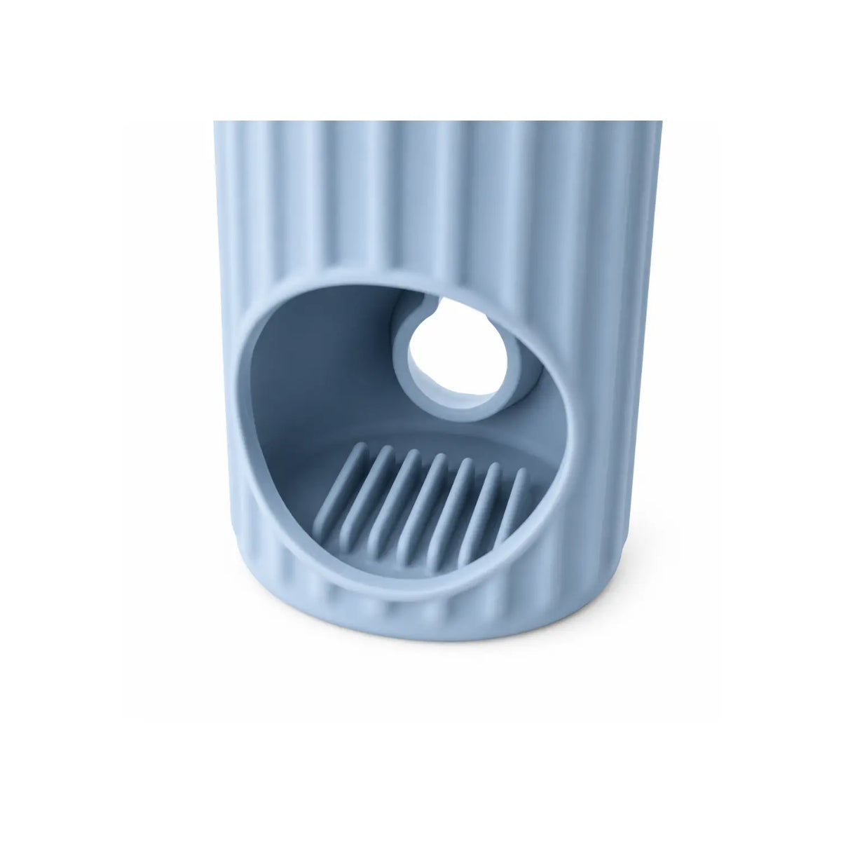 View of the powder blue Ripple silicone bath spout cover showing the faucet opening