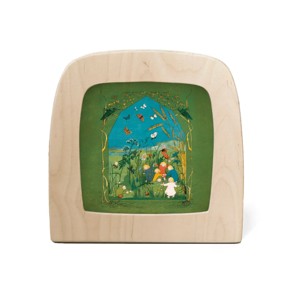 Root Children summer meadow scene displayed in a wooden Toverlux Lamp