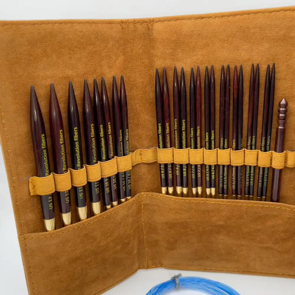 Close-up of polished rosewood circular knitting needle tips