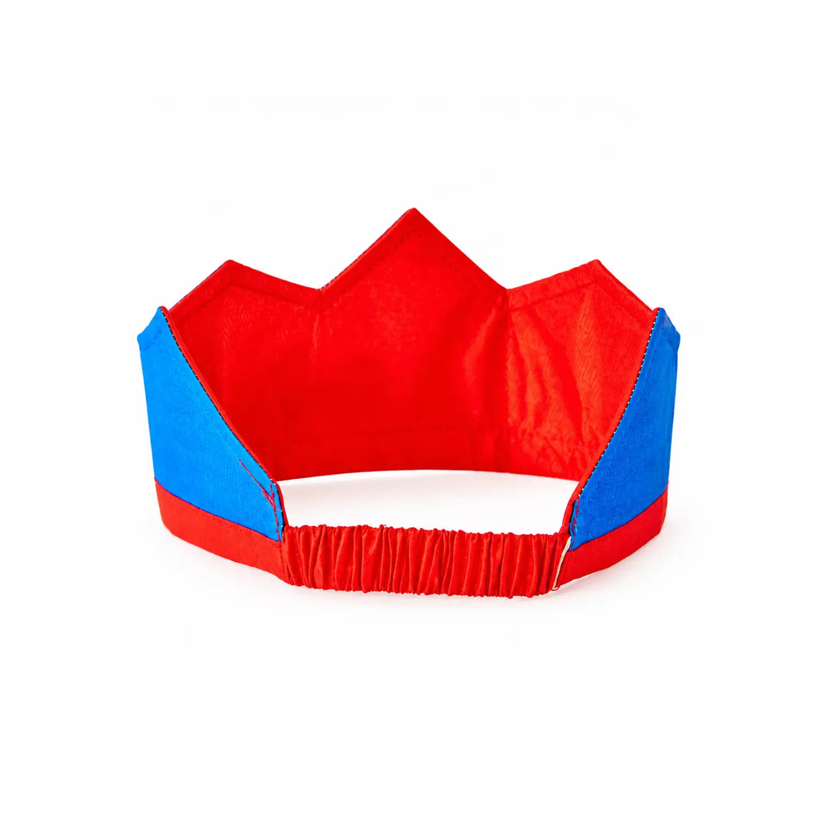 Back view of the royal blue and red silk crown showing the red silk lining and gathered elastic band