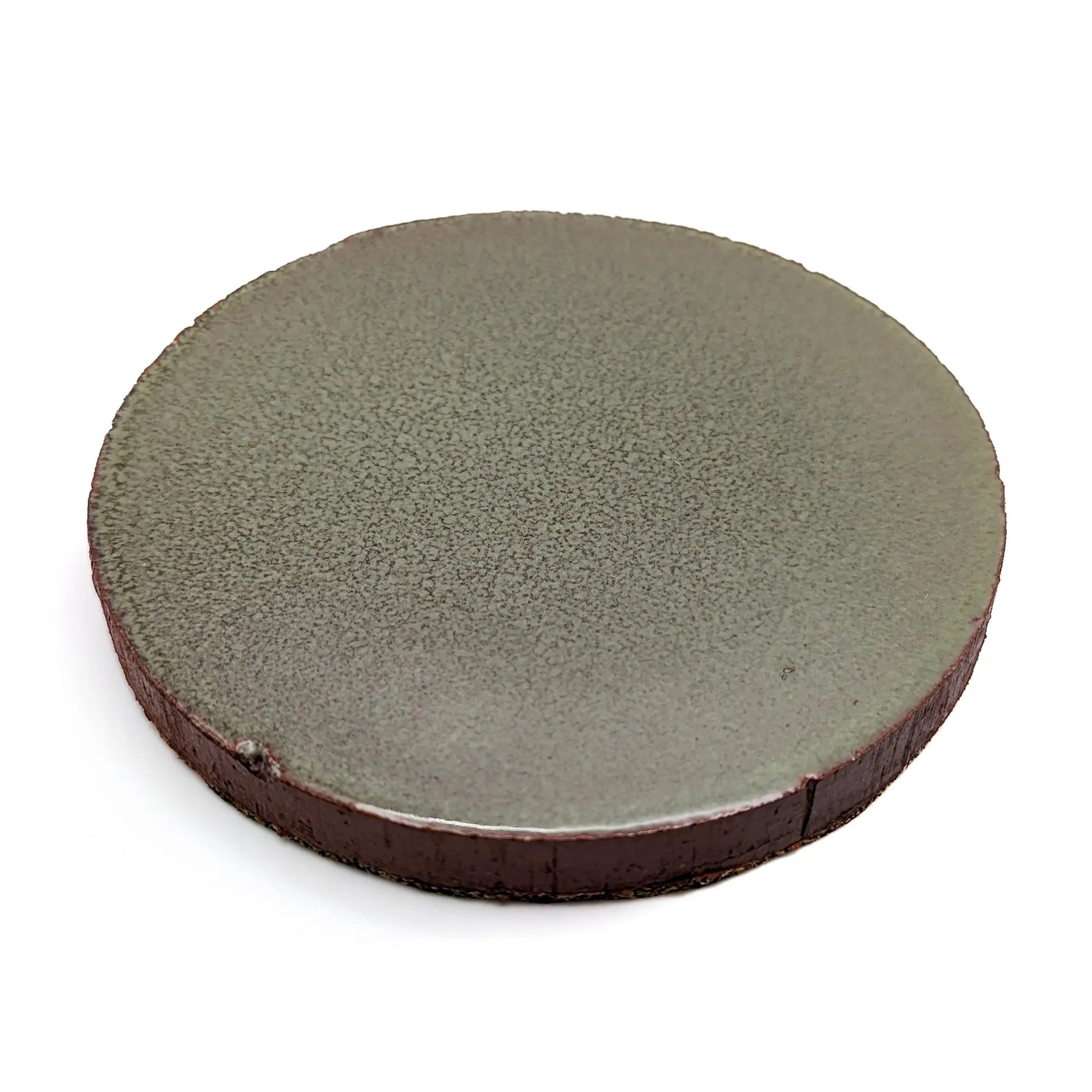 Sage green glazed ceramic pillar candle base with cork backing