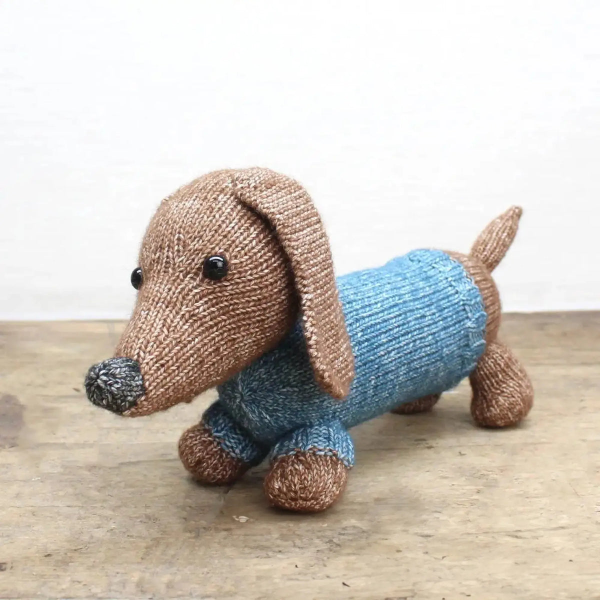 Finished dachshund stuffed animal made from a Scheepjes knitting kit