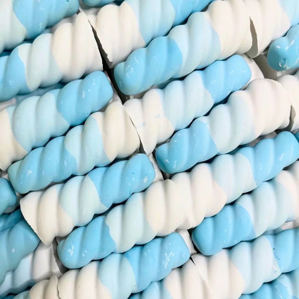 Close-up of blue and white spiral Twee Narwhal Horn outdoor sidewalk chalk for kids