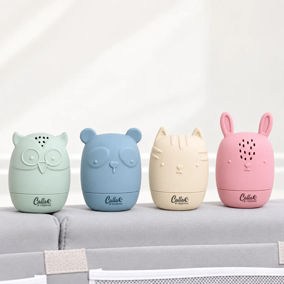 Pastel Calla & Friends silicone bath toys in owl, bear, cat, and bunny shapes